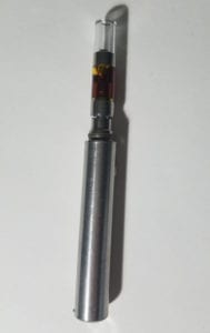 Atlas Extracts cartridge on vape pen