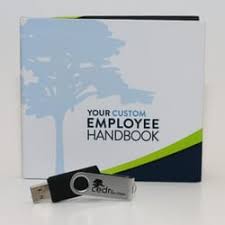 The custom employee handbook and a pendrive